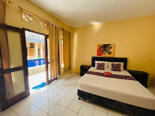 Imagen de la habitación del Hotel Mawar Bungalow. Foto 6
