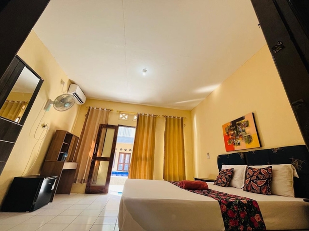 Imagen de la habitación del Hotel Mawar Bungalow. Foto 7