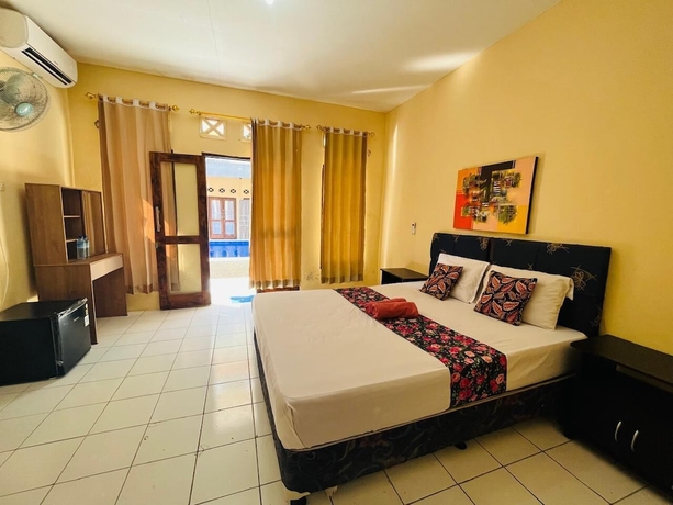 Imagen de la habitación del Hotel Mawar Bungalow. Foto 8