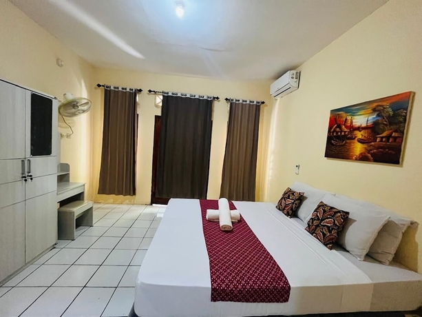 Imagen de la habitación del Hotel Mawar Bungalow. Foto 9