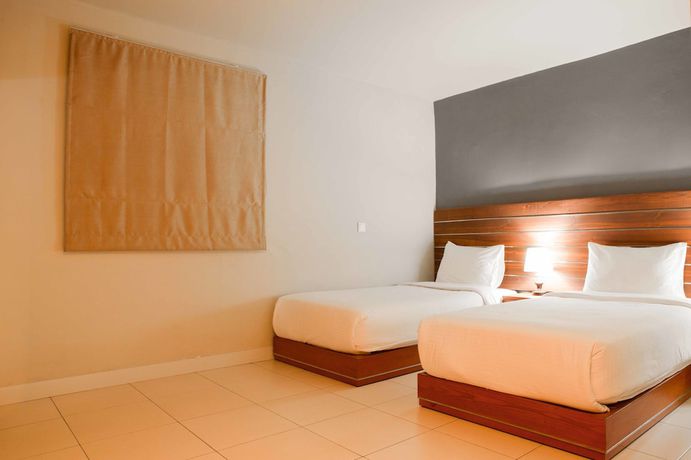 Imagen de la habitación del Hotel Mawar. Foto 5