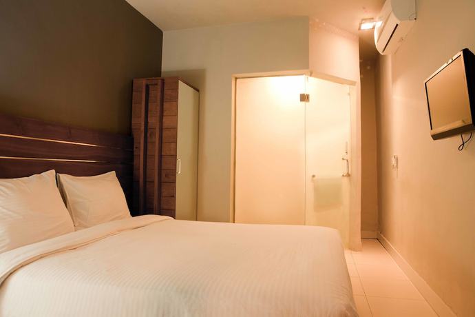 Imagen de la habitación del Hotel Mawar. Foto 6