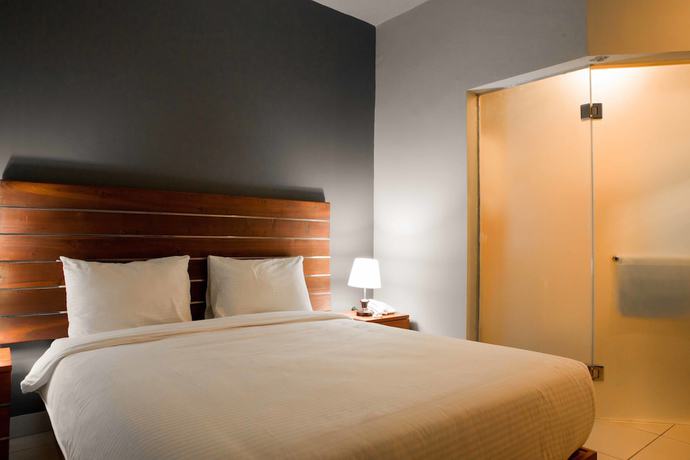 Imagen de la habitación del Hotel Mawar. Foto 7