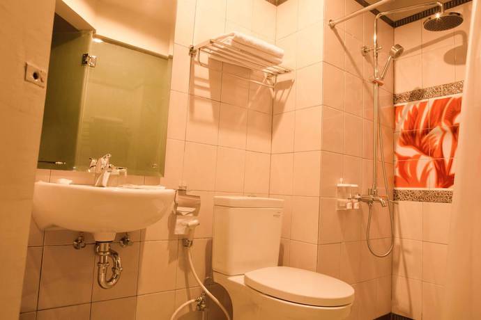 Imagen de la habitación del Hotel Mawar. Foto 8