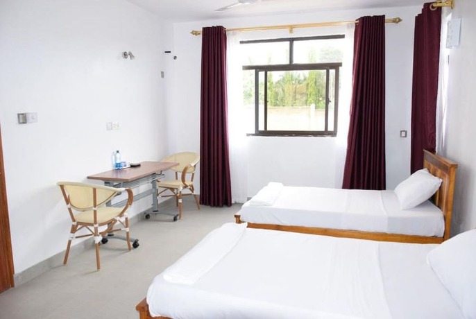 Imagen de la habitación del Hotel Mawenzi Resort and Conference. Foto 16
