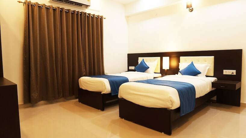 Imagen de la habitación del Hotel Max Clarks Inn Bhagalpur. Foto 15