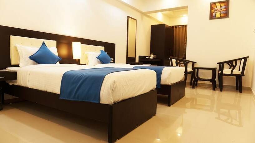 Imagen de la habitación del Hotel Max Clarks Inn Bhagalpur. Foto 16