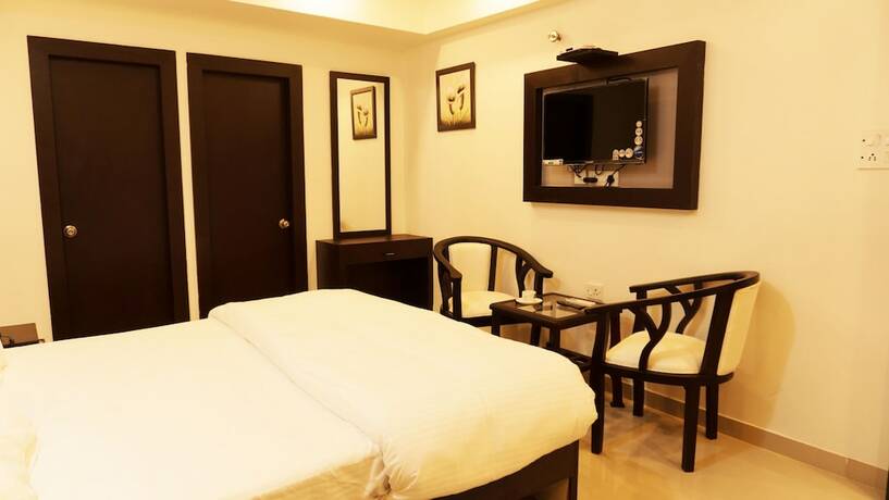 Imagen de la habitación del Hotel Max Clarks Inn Bhagalpur. Foto 17