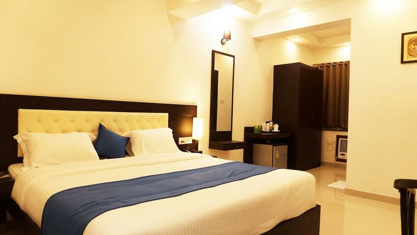 Imagen de la habitación del Hotel Max Clarks Inn Bhagalpur. Foto 18