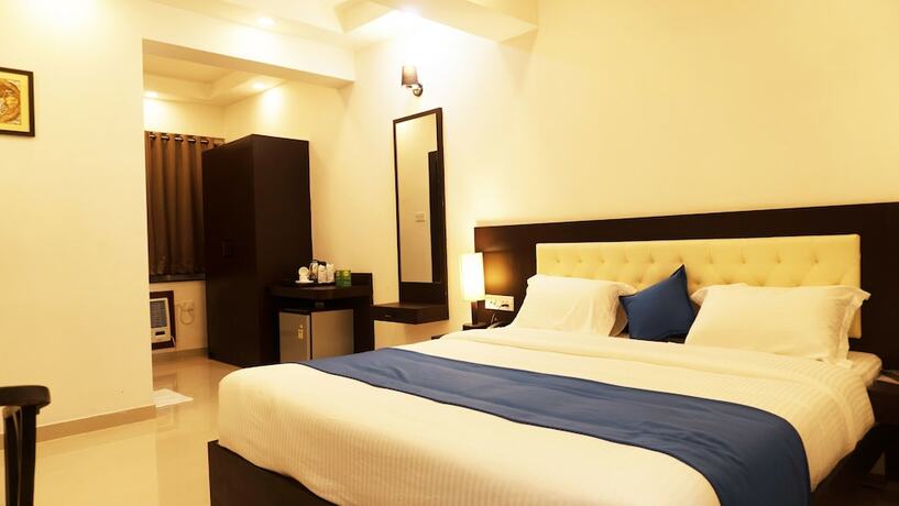 Imagen de la habitación del Hotel Max Clarks Inn Bhagalpur. Foto 19
