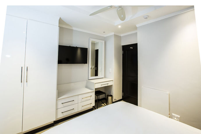 Imagen de la habitación del Hotel Max Executive Apartments. Foto 4