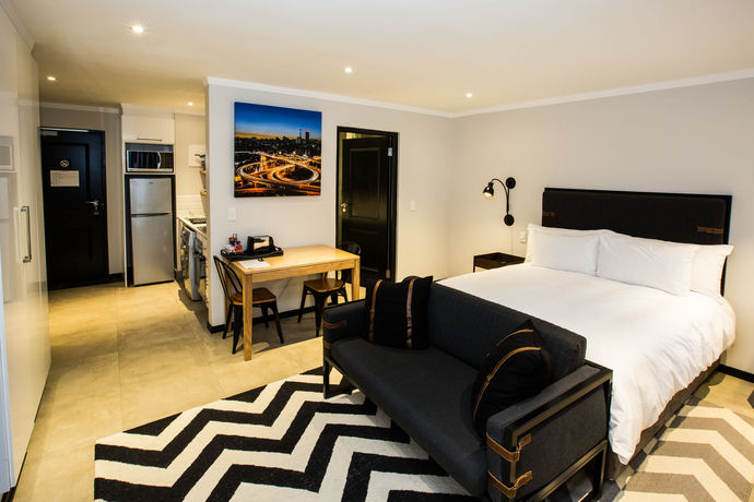 Imagen de la habitación del Hotel Max Executive Apartments. Foto 11