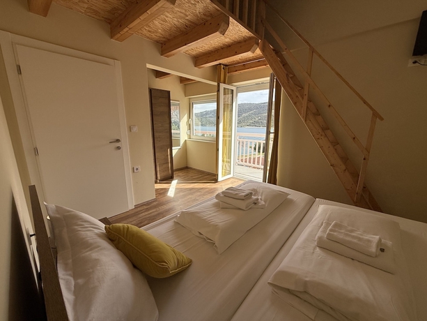 Imagen de la habitación del Hotel Max Gastro Beach House. Foto 11