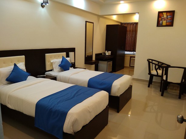 Imagen de la habitación del Hotel Max Inn, Katihar. Foto 8