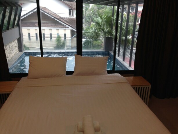 Imagen de la habitación del Hotel Max Pavillage Bangkok. Foto 26