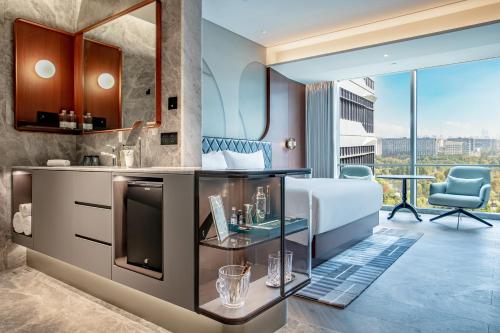 Imagen de la habitación del Hotel MaxX By Steigenberger Shanghai,Hongqiao. Foto 10