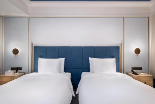 Imagen de la habitación del Hotel MaxX by STEIGENBERGER Huaxuan Guangzhou. Foto 9