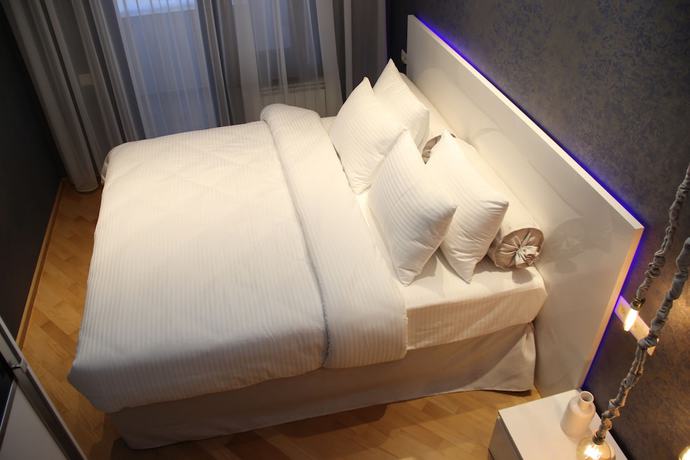 Imagen de la habitación del Hotel Maxela and Suites. Foto 19