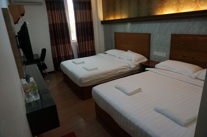 Imagen de la habitación del Hotel Maxi Inn. Foto 7