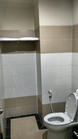 Imagen de la habitación del Hotel Maxi Kedonganan. Foto 12