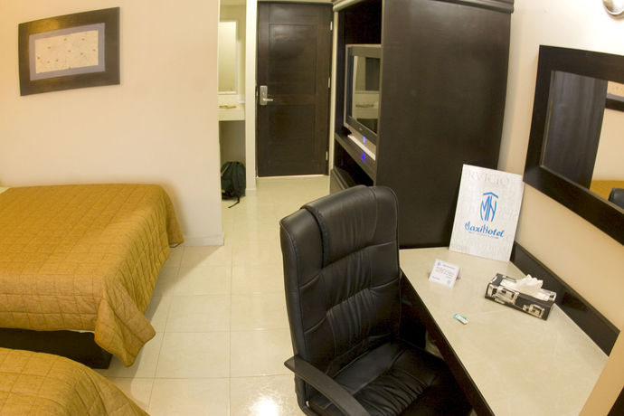 Imagen de la habitación del Hotel Maxihotel Business Class. Foto 11