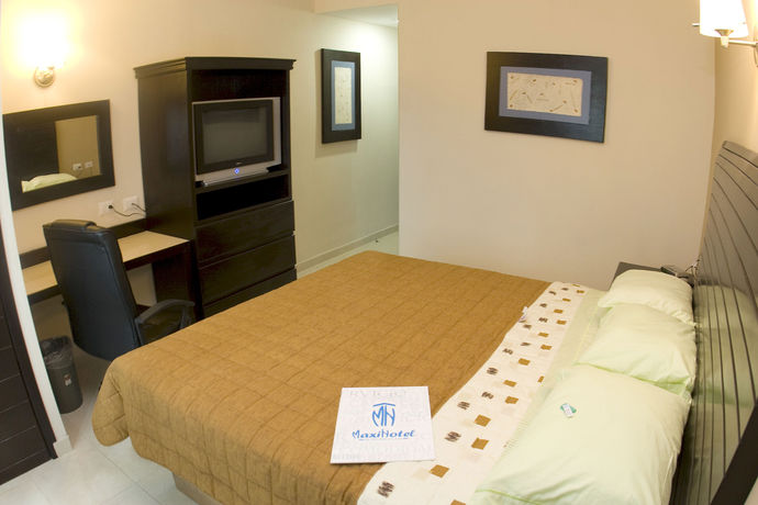 Imagen de la habitación del Hotel Maxihotel Business Class. Foto 12
