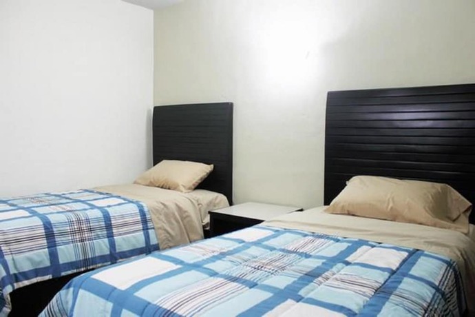 Imagen de la habitación del Hotel Maxihotel Los Mochis. Foto 7