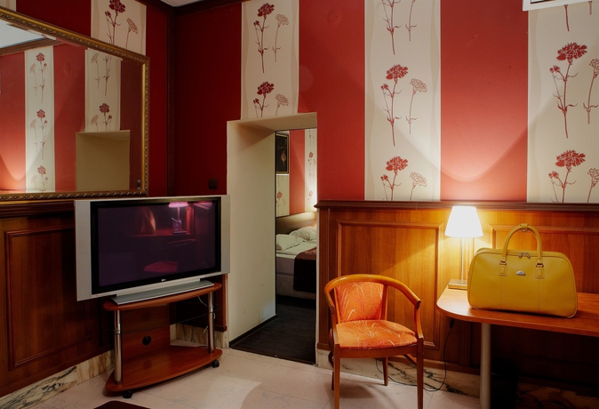 Imagen de la habitación del Hotel Maxim Boutique. Foto 7