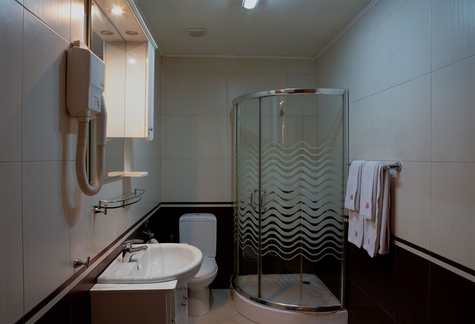 Imagen de la habitación del Hotel Maxim Boutique. Foto 8