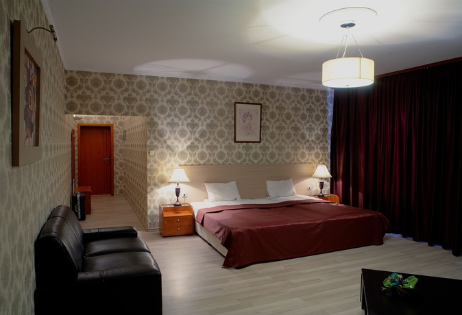 Imagen de la habitación del Hotel Maxim Boutique. Foto 9