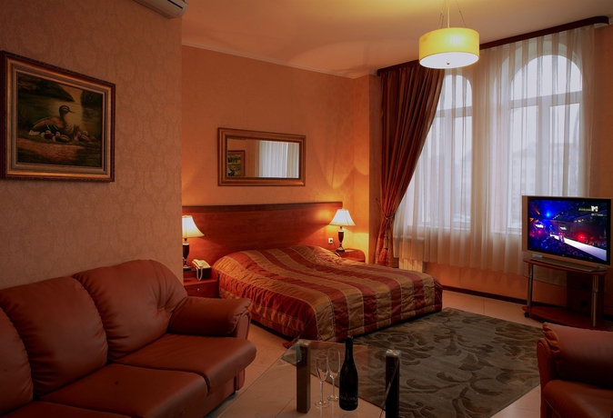 Imagen de la habitación del Hotel Maxim Boutique. Foto 10