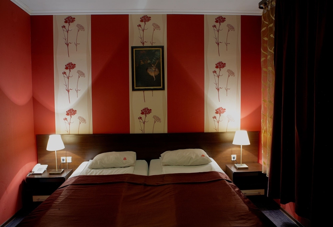 Imagen de la habitación del Hotel Maxim Boutique. Foto 11