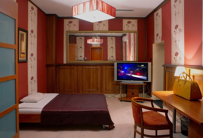 Imagen de la habitación del Hotel Maxim Boutique. Foto 12