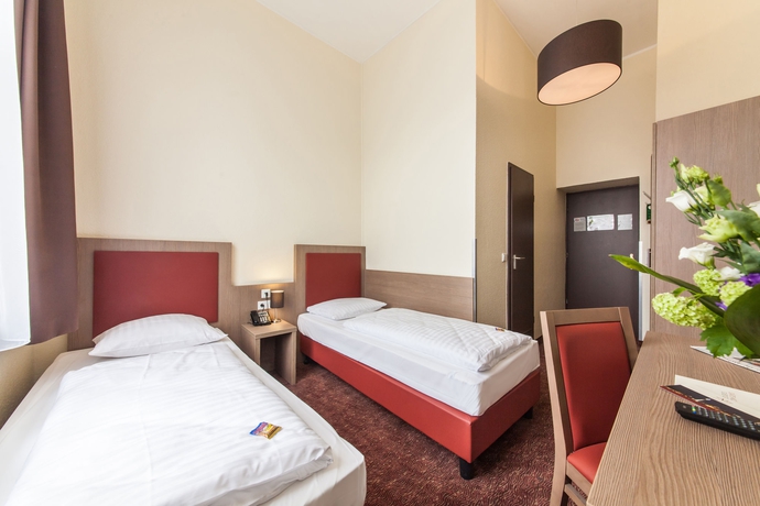 Imagen de la habitación del Hotel Maxim Düsseldorf City. Foto 4