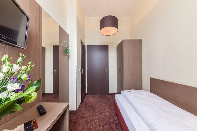 Imagen de la habitación del Hotel Maxim Düsseldorf City. Foto 6