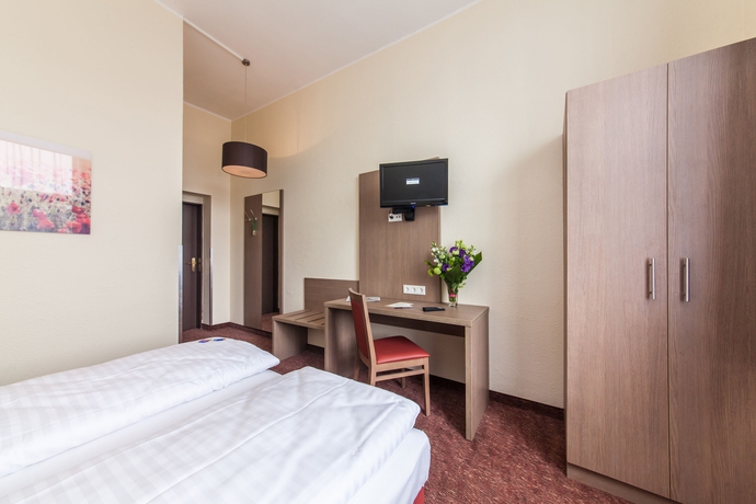 Imagen de la habitación del Hotel Maxim Düsseldorf City. Foto 10