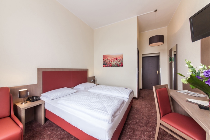 Imagen de la habitación del Hotel Maxim Düsseldorf City. Foto 11