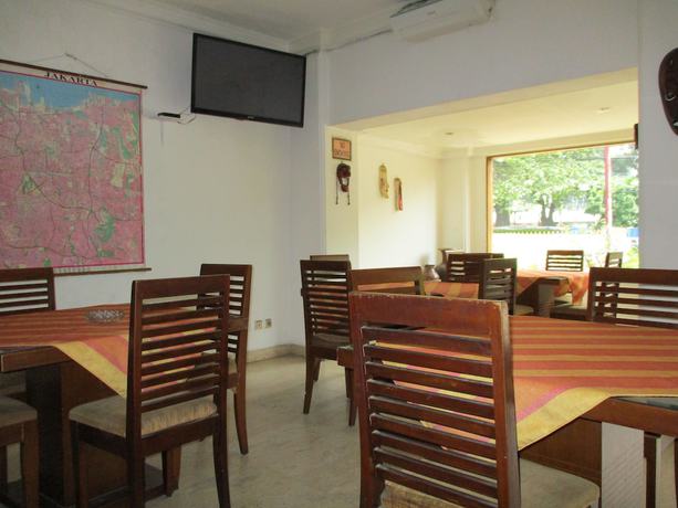 Imagen del bar/restaurante del Hotel Maxim, Kwitang. Foto 4