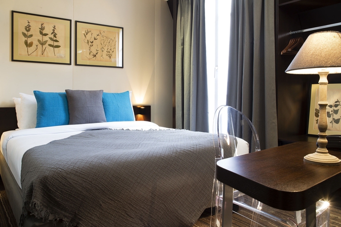 Imagen de la habitación del Hotel Maxim Quartier Latin. Foto 5