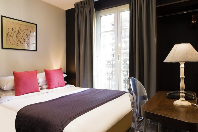 Imagen de la habitación del Hotel Maxim Quartier Latin. Foto 7