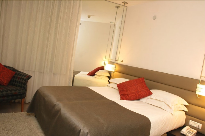 Imagen de la habitación del Hotel Maxim Tel Aviv. Foto 6