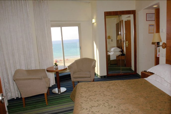 Imagen de la habitación del Hotel Maxim Tel Aviv. Foto 7