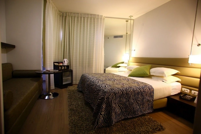 Imagen de la habitación del Hotel Maxim Tel Aviv. Foto 9