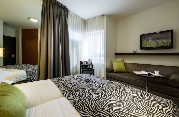 Imagen de la habitación del Hotel Maxim Tel Aviv. Foto 10