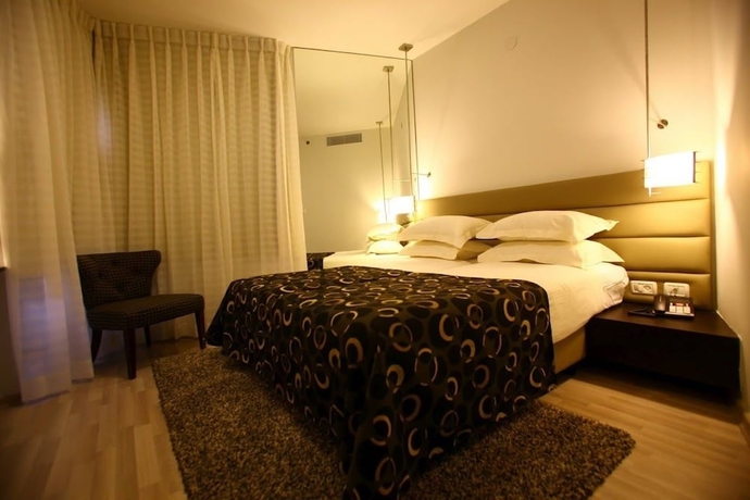 Imagen de la habitación del Hotel Maxim Tel Aviv. Foto 13