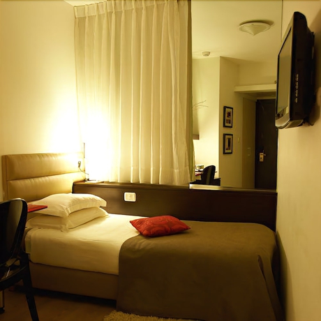 Imagen de la habitación del Hotel Maxim Tel Aviv. Foto 15