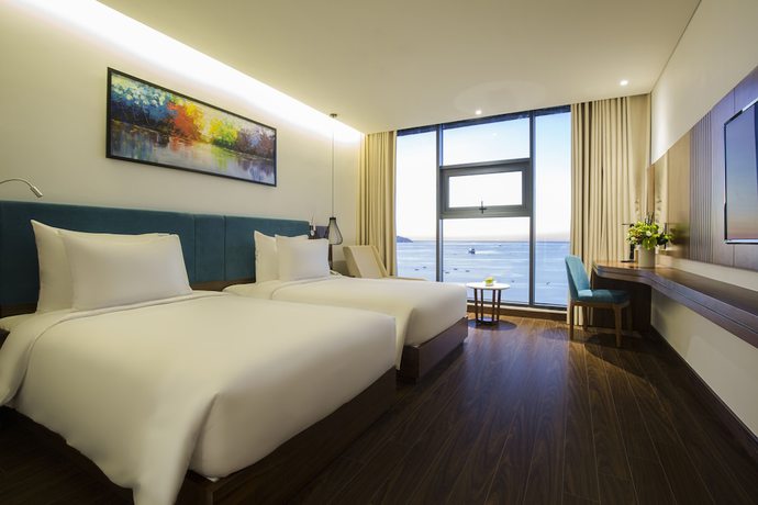 Imagen de la habitación del Hotel Maximilan Danang Beach. Foto 5