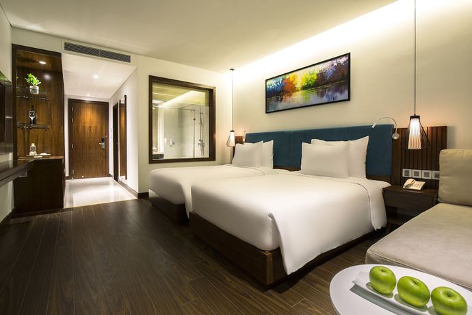 Imagen de la habitación del Hotel Maximilan Danang Beach. Foto 8
