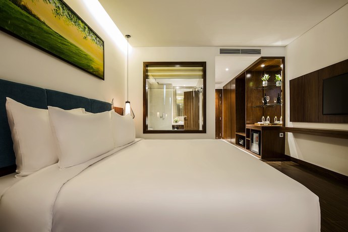 Imagen de la habitación del Hotel Maximilan Danang Beach. Foto 10