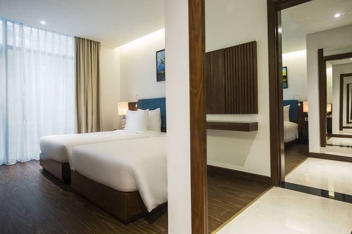 Imagen de la habitación del Hotel Maximilan Danang Beach. Foto 16